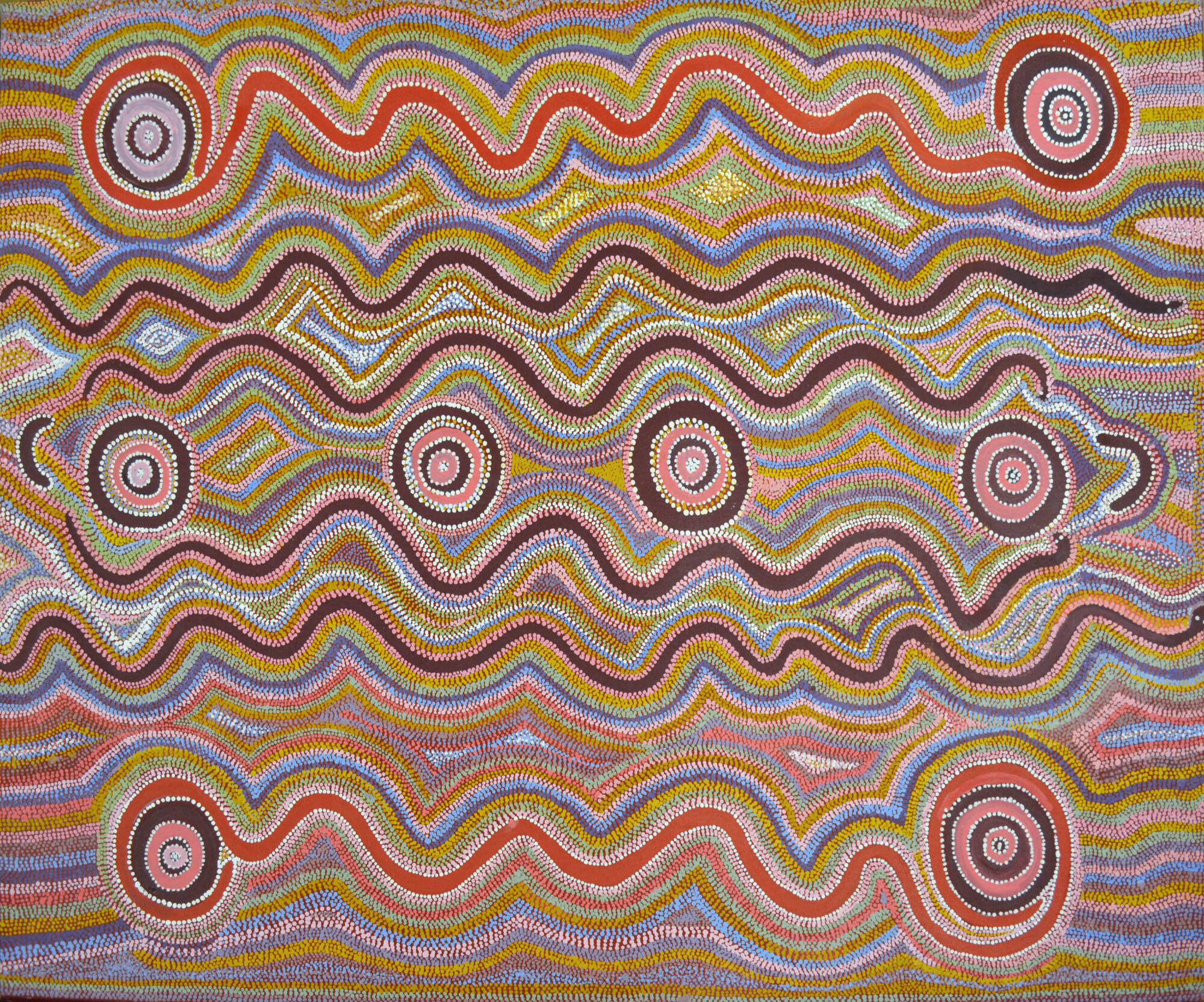 Concentric circles in each corner, as well as four lined up in the center. The background is composed of colorful wavy lines made of dots
